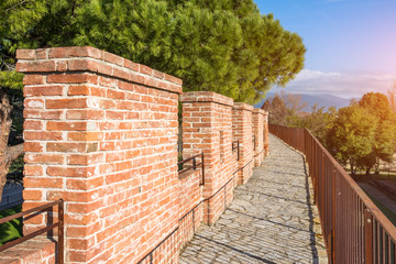 Walking trail lookout on a brick wall.