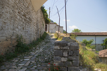 Fototapeta na wymiar An alley that leads to an old, traditional Berat house, Albania.