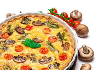Baked homemade quiche pie in ceramic baking form