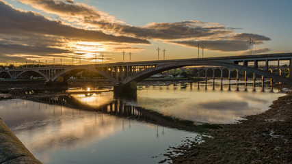 Royal Tweed Bridge and Royal Border bridge in the background, leading over the River Tweed in Berwick-Upon-Tweed, Northumberland, England, UK