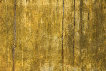 Old dirty yellow white wall with scratches and stains of paint and mold. rough surface texture