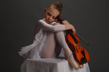 girl ballerina with a violin