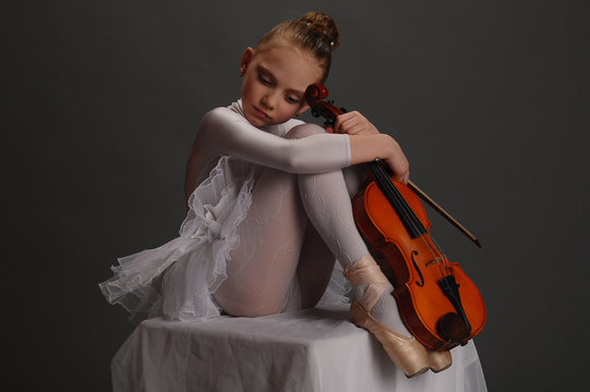 Girl Ballerina With A Violin
