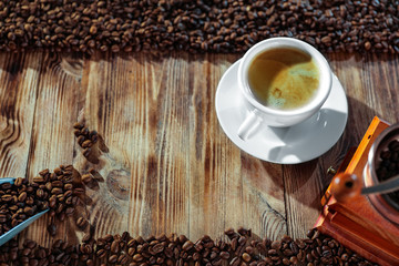 Naklejka premium Wooden table and fresh coffee 