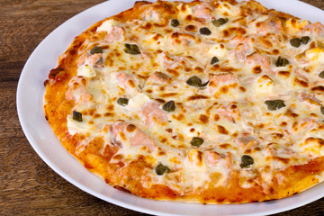 Pizza with salmon and capers