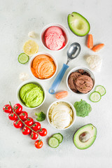 Trendy vegan food, summer healthy dessert concept, colorful diet vegetable ice cream with avocado, cucumber, tomato, beet, carrot, broccoli, cauliflower. Frozen veggie smoothie,  banner
