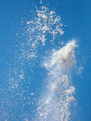 Splashes of water against the blue sky
