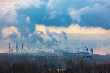Smoke from pipes at the plant pollutes the environment