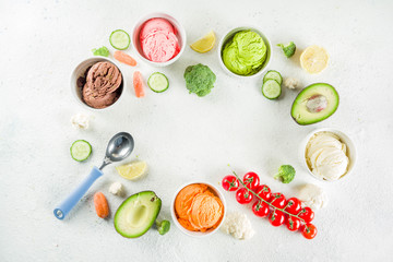 Trendy vegan food, summer healthy dessert concept, colorful diet vegetable ice cream with avocado, cucumber, tomato, beet, carrot, broccoli, cauliflower. Frozen veggie smoothie,  banner