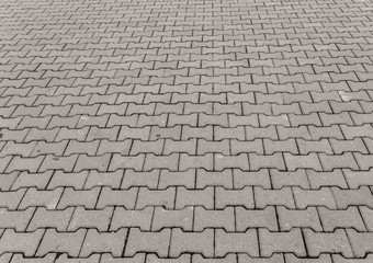 Fototapeta premium Stone blocks on the road as an abstract background