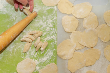 Preparation for cooking homemade dumplings woman chef at home