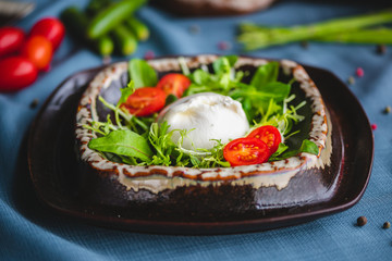 breakfast, poached egg with salad 
