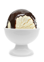 Vanilla ice cream scoop with chocolate syrup, sauce or sherbet in bowl isolated on white background