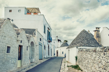 Brick houses trulli in Alberobello. Puglia Italy on a sunny day. UNESCO Cultural Heritage List