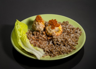 Plate with a buckwheat and turkey meatballs