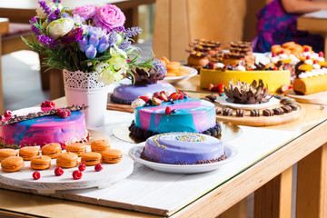Showcase with modern dessert - cakes and sweets