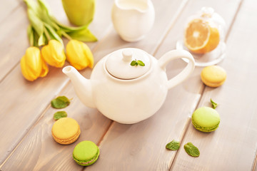 Spring card template. Happy Birthday or Valentine. Women's Day. Greeting card for mother's day. Congratulation with flowers. Flower card. Copy space. Wedding invitation.Tea set with flowers and sweet