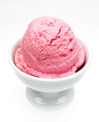 Strawberry ice cream scoop in bowl isolated on white background
