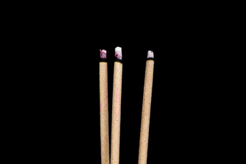 The burned incense on the black backgroun