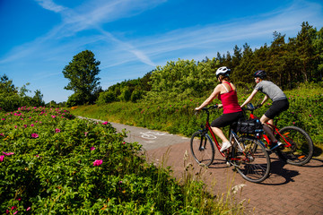 Healthy lifestyle - people riding bicycles