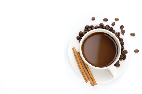 Top view of coffee with cinnamon on white background. - image