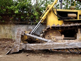 Fototapeta na wymiar Parked bulldozer at a construction site