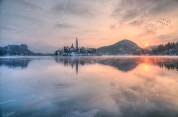 Naklejka premium Amazing sunset at the lake Bled in winter, Slovenia.