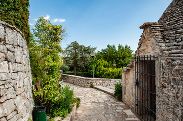 Brick roofs trulli in Alberobello. Puglia Italy on a sunny day. UNESCO Cultural Heritage List