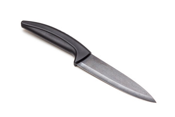 Black knife with ceramic blade on white background