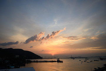 Sunset over the sea , seaport , perfect beautiful sky