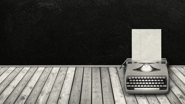 grey typewriter with old paper blank frame with blackboard background with grunge and scratches