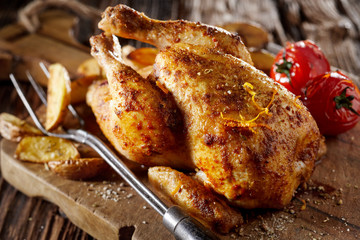 Grilled seasoned young poussin chicken