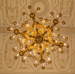 Beautiful antique bronze chandelier with crystal pendants