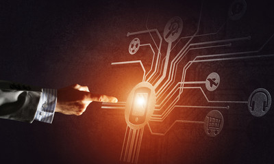 Close of businessman hand showing at user interface glowing on w