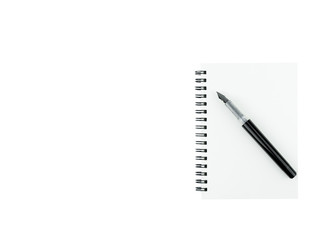 Ink pen on note book with copy space on isolated white background