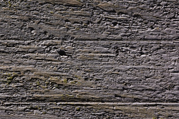 Cracking and peeling paint on a wall