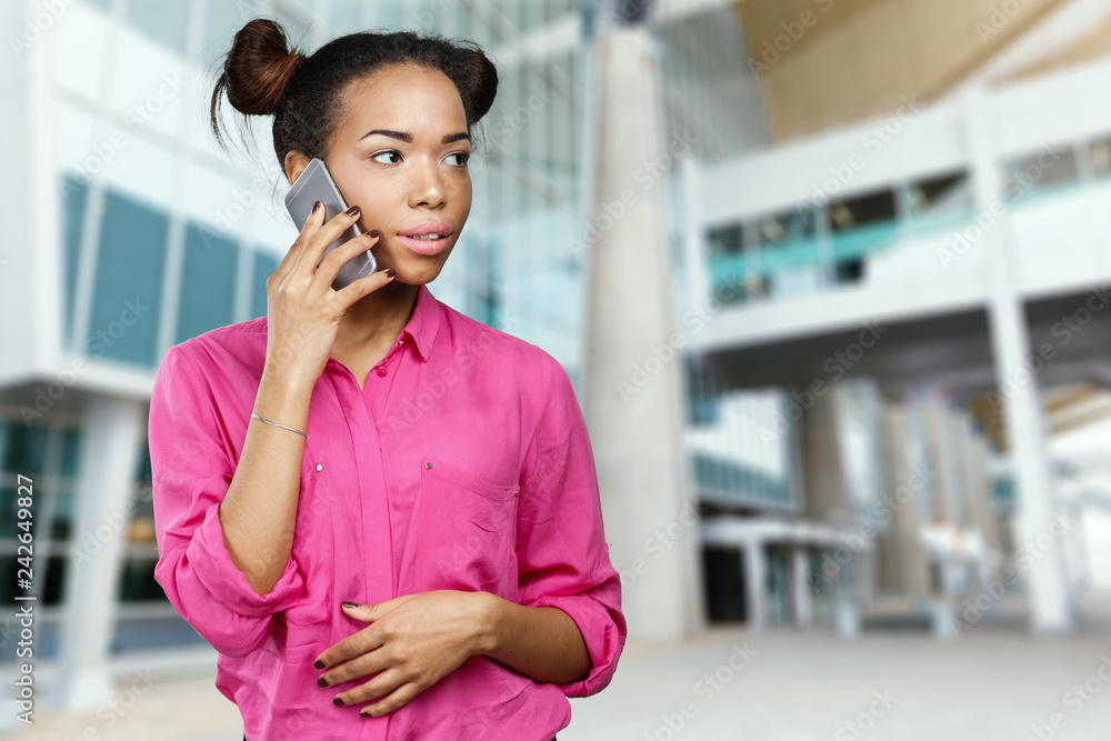 Canvas Prints African American Woman with a mobile phone