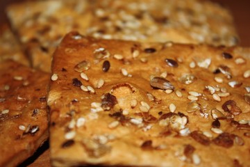 Vegan crunchy cookies with sunflower, flax seeds and sesame seeds isolated