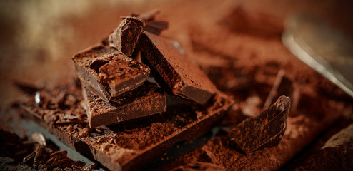 Product hero shot of chocolate on wooden desk. 