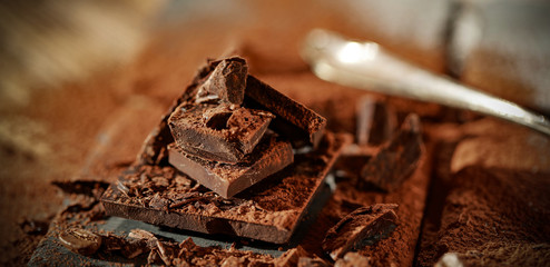 Product hero shot of chocolate on wooden desk. 