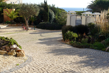 Stone block paved driveway of home