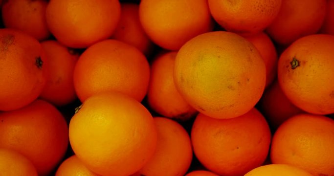  Close-up of orange fruits in basket at supermarket 4k