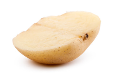 raw yellow potato isolated on white background