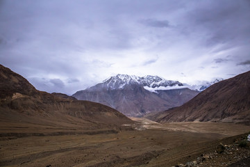 Fototapeta na wymiar Scenic view between path on Khardung La, mountain pass in the Ladakh region of Jammu and Kashmir.