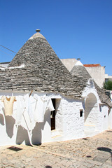 Fototapeta na wymiar Truli houses in the center of Alberobello, Puglia, Italy.