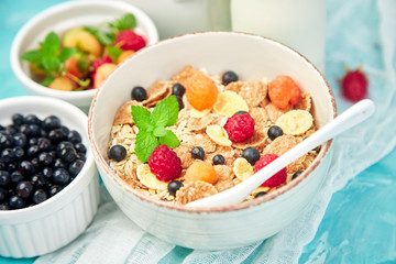 Healthy vegetarian breakfast. Oatmeal, granola with raspberries