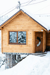 wooden house in winter