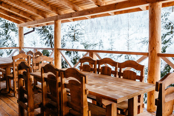 tables and chairs in restaurant in winter