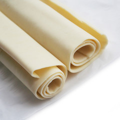 Puff pastry dough rolls isolated on white background
