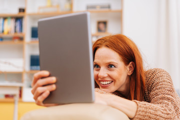 Young woman smiling with delight